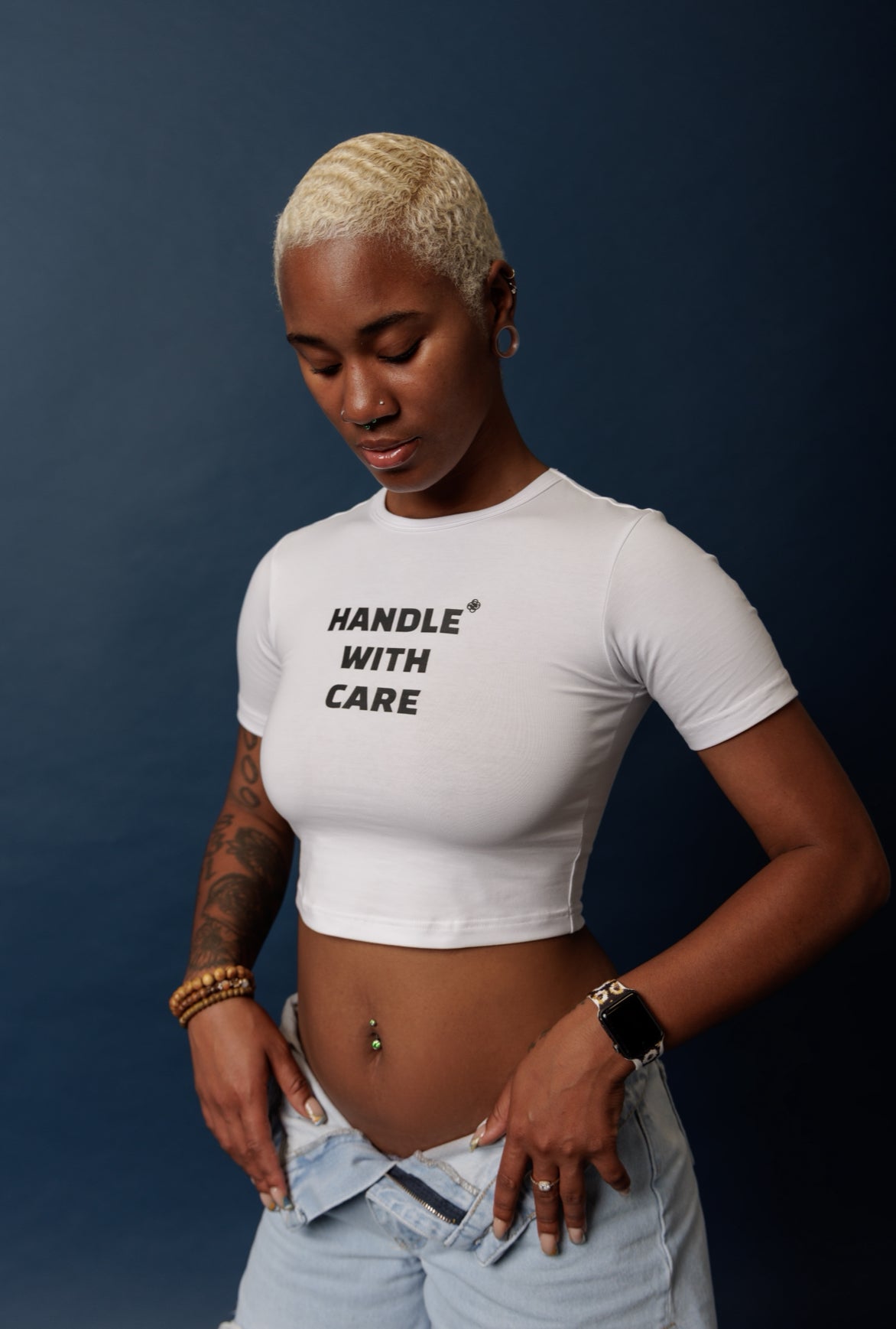 “HANDLE WITH CARE” CROP TOP