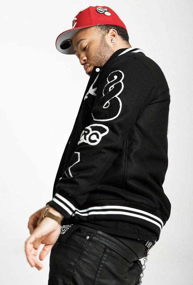 black, trc letterman jacket, side view, black male model